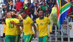 May Mahlangu (15) of South Africa celebrates after Thamsanqa Gabuza of South Africa scores during the international friendly between South Africa and Angola at Cape Town Stadium, Cape Town on 16 June 2015  ©Ryan Wilkisky/BackpagePix