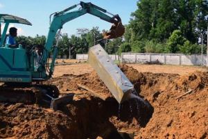 Picture: (Courtesy of www.abc.net.au 940 × 627Search by image Khadiwada Narayanz Dhairali's body exhumed from grave site)