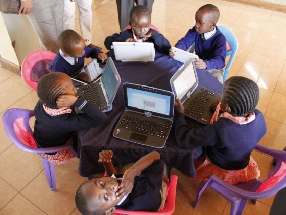 Pupils with laptops