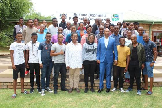 Premier Supra Mahumapelo with the students who will be studying at Denel Technical Academy. He is also joined by the Director-General Dr Keneilwe Sebego