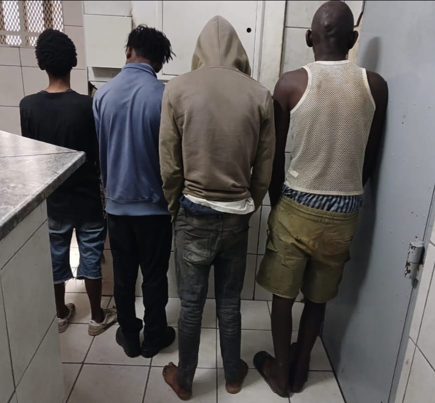 Four men arrested for robbery remanded in custody | The Guardian